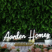 Aarden Homes White Neon Sign