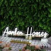 Aarden Homes White Neon Sign