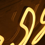 Arabic Text Yellow Neon Sign