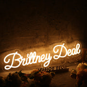 Brittney Deal Yellow Neon Sign