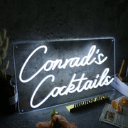 Conrad's Cocktails White Neon Sign