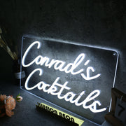 Conrad's Cocktails White Neon Sign