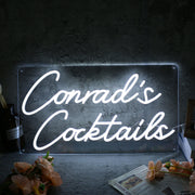 Conrad's Cocktails White Neon Sign