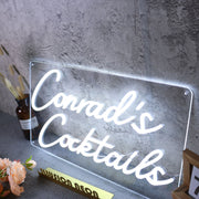 Conrad's Cocktails White Neon Sign