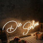 Die Schlees Yellow Neon Sign