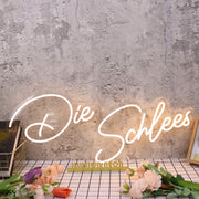 Die Schlees Yellow Neon Sign