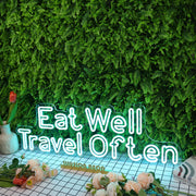 Eat Well Travel Often Blue Neon Sign