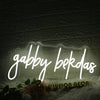 Gabby Bekdas White Neon Sign