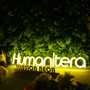 Humanitera Yellow Neon Sign