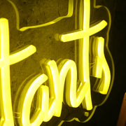 Kruah Consultants LLC Yellow Neon Sign