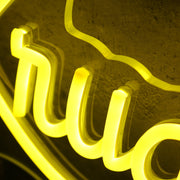 Kruah Consultants LLC Yellow Neon Sign