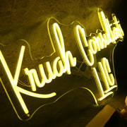 Kruah Consultants LLC Yellow Neon Sign