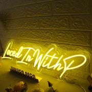 Loced In With P Yellow Neon Sign