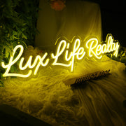 Lux Like Realty Yellow Neon Sign