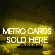 Metro Cards Sold Here Yellow Neon Sign