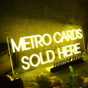 Metro Cards Sold Here Yellow Neon Sign