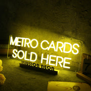 Metro Cards Sold Here Yellow Neon Sign