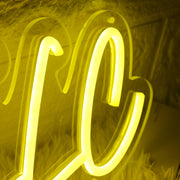 MJ Social LLC Yellow Neon Sign