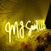 MJ Social LLC Yellow Neon Sign