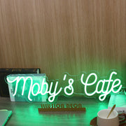 Moby's Cafe Green Neon Sign