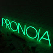 Pronoia Green Neon Sign