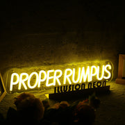 Proper Rumpus Yellow Neon Sign