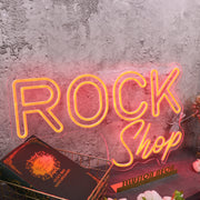 Rock Shop Orange Neon Sign