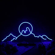 Silhouette Of Mountains And Sun Blue Neon Sign