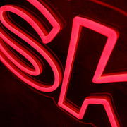 SKELTO Red Noen Sign