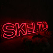 SKELTO Red Noen Sign