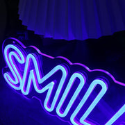 Smile More Blue Neon Sign