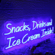 Snacks Drinks And Ice Cream Inside Blue Neon Sign