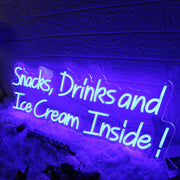 Snacks Drinks And Ice Cream Inside Blue Neon Sign