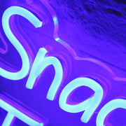 Snacks Drinks And Ice Cream Inside Blue Neon Sign