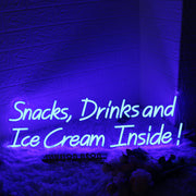 Snacks Drinks And Ice Cream Inside Blue Neon Sign