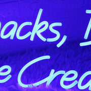 Snacks Drinks And Ice Cream Inside Blue Neon Sign