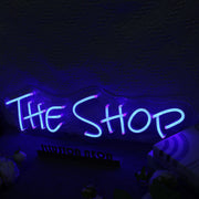 The Shop Blue Neon Sign