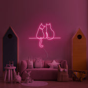 Two Cats Looking Neon Sign