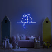 Two Cats Looking Neon Sign