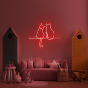 Two Cats Looking Neon Sign