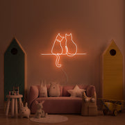 Two Cats Looking Neon Sign