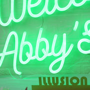 Welcome to Abbys Jungle Green Neon Sign