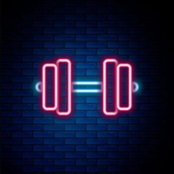 A Glowing Barbell Neon Sign Hung On The Brick Wall Background