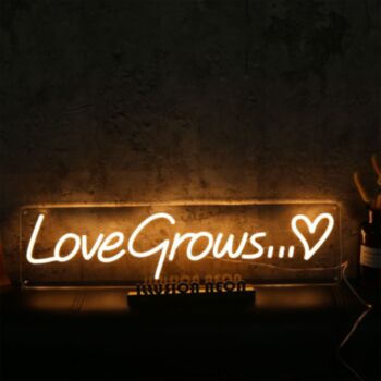 Love Grows Yellow Neon Sign