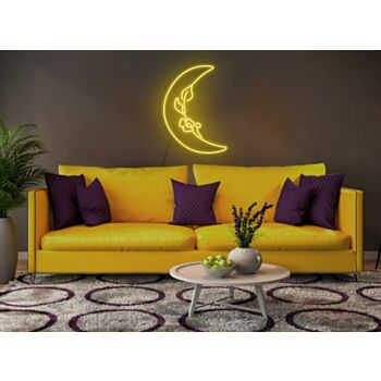 Moon Neon Sign Hung On The Wall Of A Room